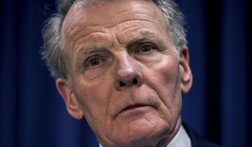 FILE - In this July 15, 2015 file photo, House Speaker Michael Madigan, D-Chicago, listens to during a news conference at the Illinois State Capitol, in Springfield, Ill. Three more Democrats withdrew support on Thursday, Nov. 19, 2020,from Speaker Michael Madigan&#39;s continued control of the Illinois House after his closest confidant and three others were indicted in a long-running bribery scheme involving utility giant ComEd. (Justin L. Fowler/The State Journal-Register via AP, File)