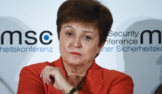 FILE - In this Feb. 14, 2020, file photo, Kristalina Georgieva, Managing Director of the International Monetary Fund, attends a session on the first day of the Munich Security Conference in Munich, Germany.   Georgieva said Thursday, Nov. 19,  that the while the United States and other major economies turned in better-than-expected economic performances in the third quarter the world now faces slower momentum with a resurgence in coronavirus cases.  (AP Photo/Jens Meyer, File)