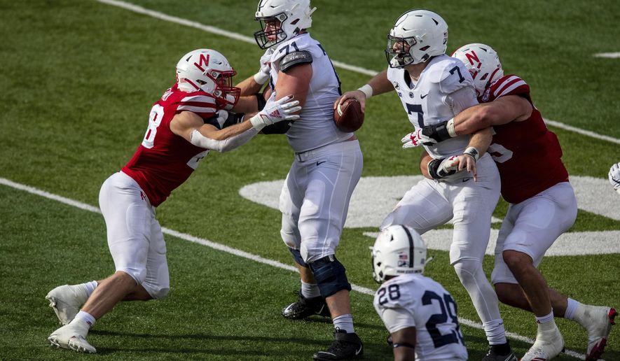 Nebraska's Ben Stille sacks Penn State's Will Levis late in the fourth quarter of an NCAA college football game in Lincoln, Neb., Saturday, Nov. 14, 2020. (Chris Machian/Omaha World-Herald via AP)