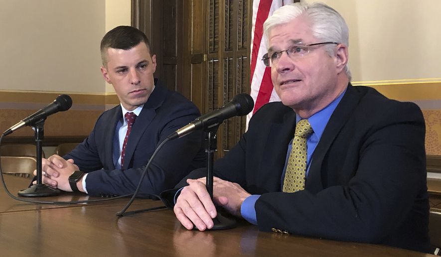 In this Jan. 30, 2020 file photo, Senate Majority Leader Mike Shirkey, R-Clarklake, right, and House Speaker Lee Chatfield, R-Levering, left, speak to the media at the Michigan Capitol in Lansing, Mich. (AP Photo/David Eggert)