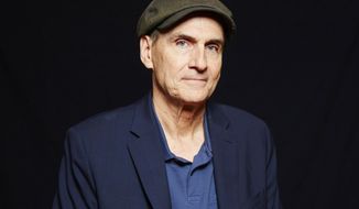 FILE - Singer-songwriter James Taylor appears during a portrait session in New York on May 13, 2015.  Taylor released “American Standard” in February and on Friday offers three ones that never made the album. The new songs are “Over The Rainbow” from “The Wizard of Oz,” “I’ve Grown Accustomed to Her Face” from “My Fair Lady” and “Never Never Land” from “Peter Pan.” (Photo by Dan Hallman/Invision/AP, File)