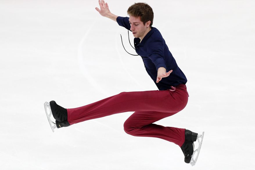 Georgia's Morisi Kvitelashvili performs in the men's short program during the ISU Grand Prix of Figure Skating- Rostelecom Cup in Moscow, Russia, Friday, Nov. 20, 2020. (AP Photo/Alexander Zemlianichenko)