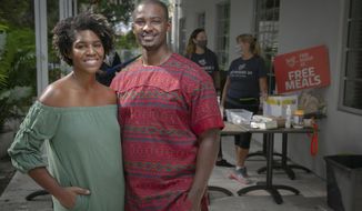 In this Nov. 11, 2020, photo, Jamila Ross and Akino West have tried various tactics to keep their Overtown bed and breakfast, Copper Door, open, in Miami. They opened a pop-up restaurant and got $35,000 in grants, including one from Beyonce’s foundation. Ross and West won a $10,000 grant for their Copper Door Bed &amp;amp; Breakfast last week from the Beygood Foundation, a collaboration between the entertainer Beyoncé and the NAACP to support Black-owned businesses affected by the coronavirus. (Jose A. Iglesias/Miami Herald via AP)