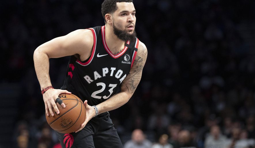 FILE - In this Jan. 4, 2020, file photo, Toronto Raptors guard Fred VanVleet looks to pass the ball during the first half of an NBA basketball game against the Brooklyn Nets in New York. VanVleet agreed Saturday, Nov. 21, 2020, to a four-year, $85 million contract to remain with the Toronto Raptors, a person with direct knowledge of the discussions told The Associated Press on condition of anonymity because the contract remains unsigned. (AP Photo/Mary Altaffer, File)