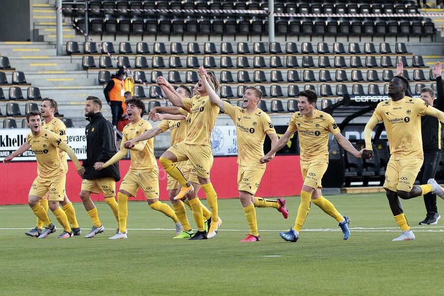 FILE - In this Aug. 27, 2020 file photo, Bodo/Glimt celebrate after the qualifying match for the Europa League between Bodo/Glimt and Kauno Zalgiris at Aspmyra Stadium in Bodo, Norway. Norway is about to get a new soccer champion. Bodo/Glimt needs just a point from its trip to Stromsgodset on Sunday, Nov. 22 to clinch the first top-flight title in its 104-year history and become the most northerly club to be Norwegian champion. (Mats Torbergsen/NTB via AP)