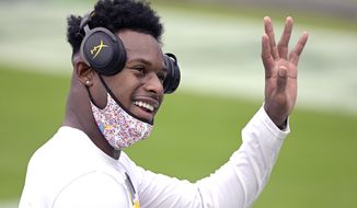 Pittsburgh Steelers wide receiver JuJu Smith-Schuster waves to fans during warm ups before an NFL football game against the Jacksonville Jaguars, Sunday, Nov. 22, 2020, in Jacksonville, Fla. (AP Photo/Phelan M. Ebenhack)