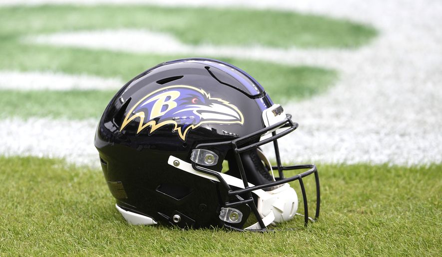 A Baltimore Ravens helmet is seen on the field prior to an NFL football game against the Tennessee Titans, Sunday, Nov. 22, 2020, in Baltimore. (AP Photo/Nick Wass) **FILE**