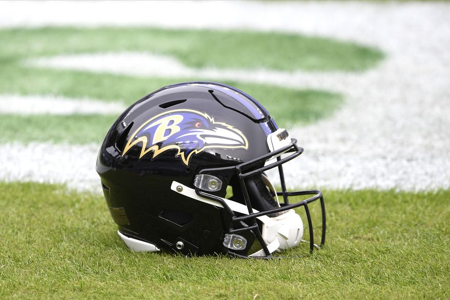 A Baltimore Ravens helmet is seen on the field prior to an NFL football game against the Tennessee Titans, Sunday, Nov. 22, 2020, in Baltimore. (AP Photo/Nick Wass) **FILE**
