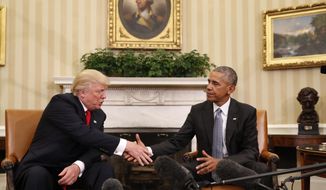 President Barack Obama shakes hands with President-elect Donald Trump in the Oval Office of the White House in Washington, Thursday, Nov. 10, 2016. (AP Photo/Pablo Martinez Monsivais) ** FILE **