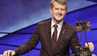 This image released by ABS shows contestant Ken Jennings with a trophy on &amp;quot;JEOPARDY! The Greatest of All Time.&amp;quot; Jennings will be the first interim guest for the late Alex Trebek, and the show will try other guest hosts before naming a permanent replacement. (Eric McCandless/ABC via AP)