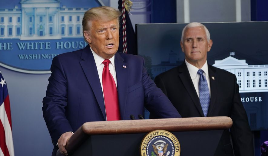 President Donald Trump speaks in the Brady Briefing Room in the White House, Tuesday, Nov. 24, 2020, in Washington as Vice President Mike Pence looks on.  (AP Photo/Susan Walsh)