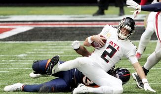 Atlanta Falcons quarterback Matt Ryan (2) is sacked by Denver Broncos defensive end Dre&#x27;Mont Jones (93) during the first half of an NFL football game, Sunday, Nov. 8, 2020, in Atlanta. (AP Photo/John Bazemore)
