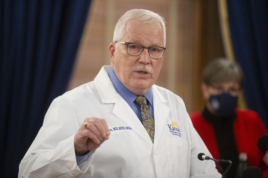Lee Norman, Kansas secretary of health and environment, gives updates to the status of state hospitals  during a news conference, Wednesday, Nov. 25, 2020 at the Statehouse in Topeka, Kan. (Evert Nelson/The Topeka Capital-Journal via AP)