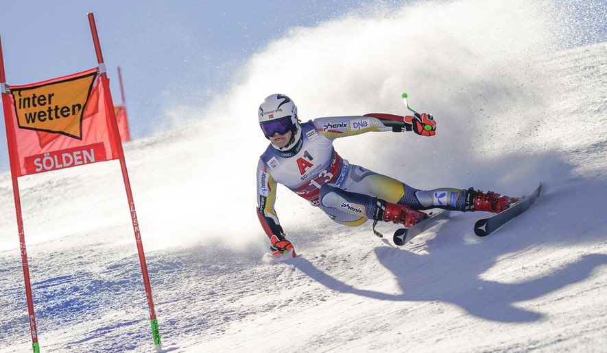 Norway&#x27;s Lucas Braathen speeds down the course on his way to win an alpine ski, men&#x27;s World Cup giant slalom in Soelden, Austria, Sunday, Oct. 18, 2020. (AP Photo/Giovanni Auletta)