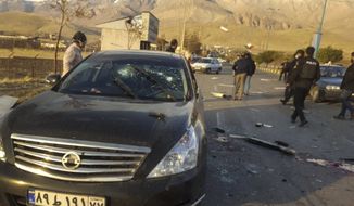 This photo released by the semi-official Fars News Agency shows the scene where Mohsen Fakhrizadeh was killed in Absard, a small city just east of the capital, Tehran, Iran, Friday, Nov. 27, 2020.  Fakhrizadeh, an Iranian scientist that Israel alleged led the Islamic Republic&#39;s military nuclear program until its disbanding in the early 2000s was assassinated Friday, state television said.  (Fars News Agency via AP)