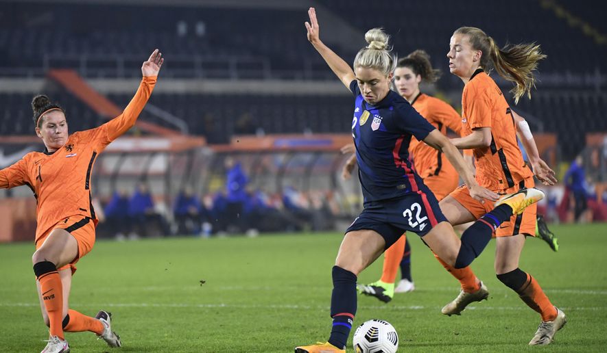 United States Kristie Mewis, number 22, scores her side&#39;s second goal during the international friendly women&#39;s soccer match between The Netherlands and the US at the Rat Verlegh stadium in Breda, southern Netherlands, Friday Nov. 27, 2020. (Piroschka van de Wouw/Pool via AP)