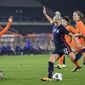 United States Kristie Mewis, number 22, scores her side&#39;s second goal during the international friendly women&#39;s soccer match between The Netherlands and the US at the Rat Verlegh stadium in Breda, southern Netherlands, Friday Nov. 27, 2020. (Piroschka van de Wouw/Pool via AP)