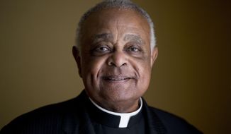 This Sunday, June 2, 2019, file photo shows Washington D.C. Archbishop Wilton Gregory posed for a portrait following mass at St. Augustine Church in Washington. (AP Photo/Andrew Harnik, File)  **FILE**