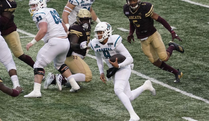 Coastal Carolina's Fred Payton (9) runs against Texas State during the second half of an NCAA college football game in San Marcos, Texas, Saturday, Nov. 28, 2020. (AP Photo/Chuck Burton)