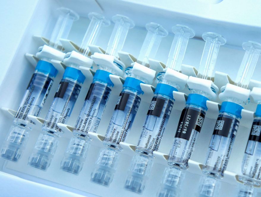 Despite the higher distribution of flu vaccines, the Centers for Disease Control and Prevention says it has not seen an uptake in flu shots as of right now. (ASSOCIATED PRESS)