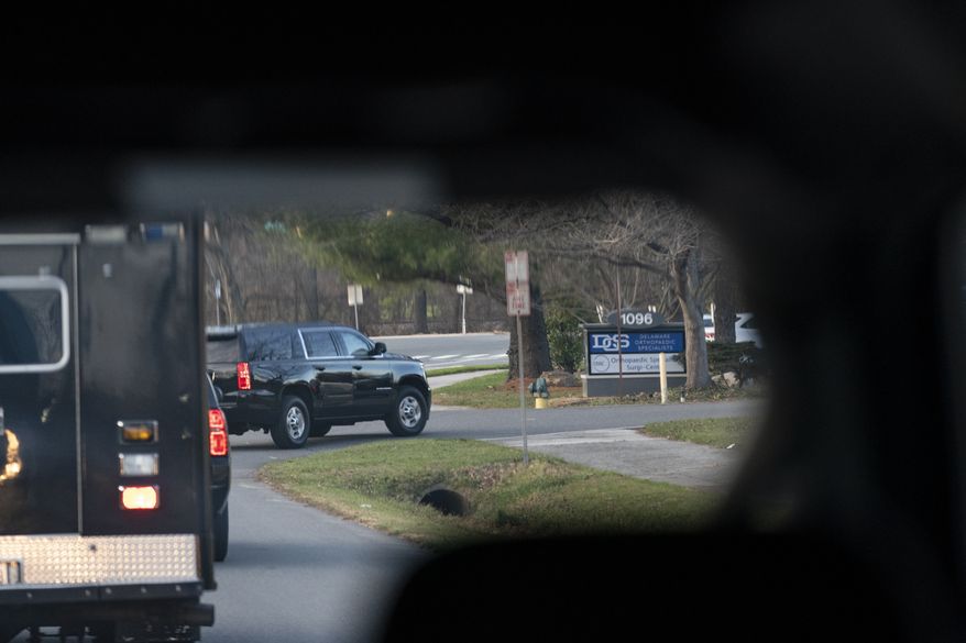 A motorcade with President-elect Joe Biden aboard arrives at Delaware Orthopedic Specialists to see a doctor, Sunday, Nov. 29, 2020, in Newark, Del. Biden slipped while playing with his dog Major and twisted his ankle. (AP Photo/Carolyn Kaster)