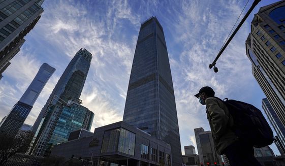 The Central Business District in Beijing gives the appearance of a global economic powerhouse, but China is exploiting its long-held classification as a ‘developing’ nation to benefit from international treaties, negotiations and commitments. (Associated Press photograph)