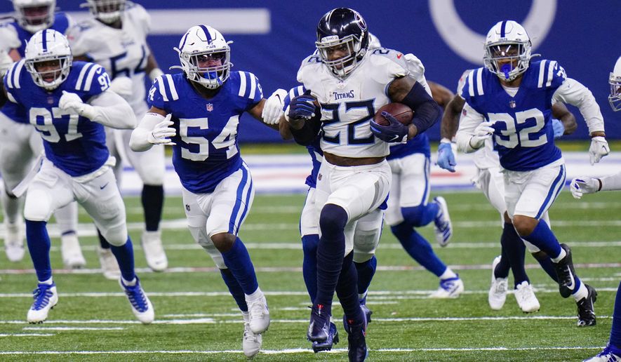 Tennessee Titans running back Derrick Henry (22) runs against the Tennessee Titans in the first half of an NFL football game in Indianapolis, Sunday, Nov. 29, 2020. (AP Photo/AJ Mast)