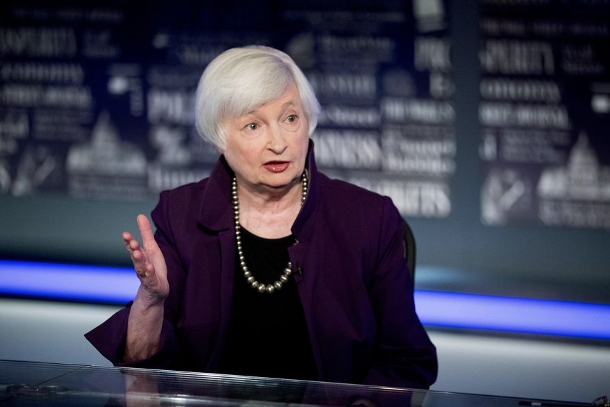 FILE - In this Aug. 14, 2019, file photo, former Fed Chair Janet Yellen speaks with Fox Business Network guest anchor Jon Hilsenrath in the Fox Washington bureau in Washington. President-elect Joe Biden is expected to name several of his most senior economic advisers in the coming days. Yellen could be one of those named. (AP Photo/Andrew Harnik, File)