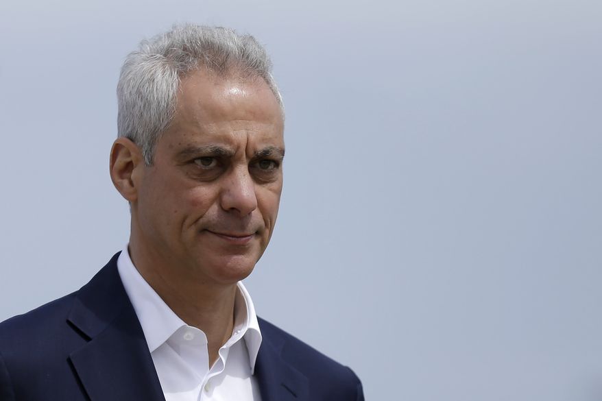 In this April 22, 2019, file photo, Chicago Mayor Rahm Emanuel waves as he arrives at a news conference outside of the south air traffic control tower at O&#39;Hare International Airport in Chicago. (AP Photo/Kiichiro Sato, File)