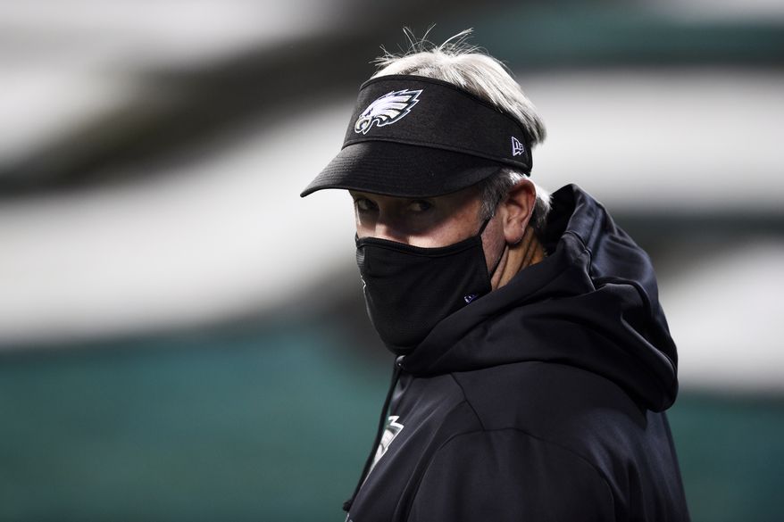 Philadelphia Eagles head coach Doug Pederson walks the field before an NFL football game against the Seattle Seahawks, Monday, Nov. 30, 2020, in Philadelphia. (AP Photo/Derik Hamilton)