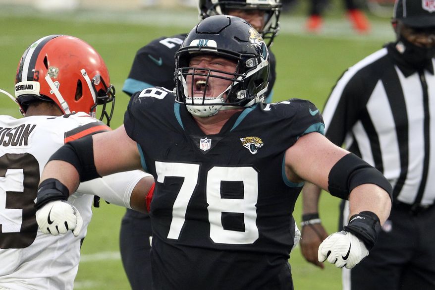 Jacksonville Jaguars offensive tackle Ben Bartch (78) celebrates as his team scored a touchdown against the Cleveland Browns during the second half of an NFL football game, Sunday, Nov. 29, 2020, in Jacksonville, Fla. (AP Photo/Stephen B. Morton)