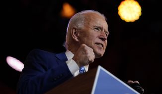 President-elect Joe Biden speaks at The Queen theater, Wednesday, Nov. 25, 2020, in Wilmington, Del. (AP Photo/Carolyn Kaster)