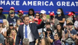 U.S. Rep. Ted Budd waves to the crowd during a campaign event at the Piedmont Triad International Airport in Greensboro, N.C., Tuesday, Oct. 27, 2020. (Khadejeh Nikouyeh/News &amp;amp; Record via AP) ** FILE **