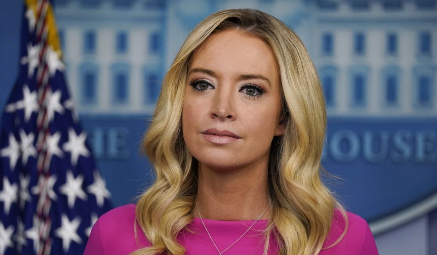 White House press secretary Kayleigh McEnany listens during a briefing at the White House, Wednesday, Dec. 2, 2020, in Washington. (AP Photo/Evan Vucci)