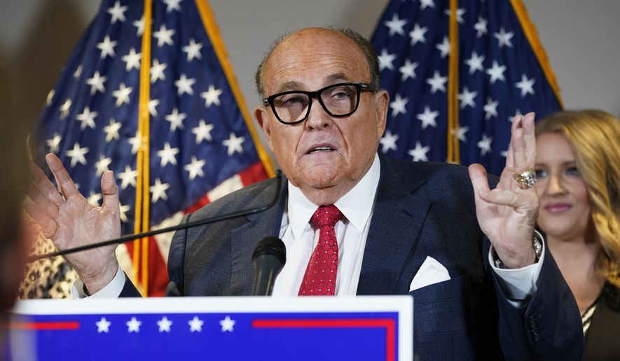In this Nov. 19, 2020, file photo, former New York Mayor Rudy Giuliani, a lawyer for President Donald Trump, speaks during a news conference at the Republican National Committee headquarters, in Washington. (AP Photo/Jacquelyn Martin, File)  **FILE**