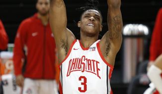Ohio State guard Eugene Brown dunks against Morehead State during the second half of an NCAA college basketball game in Columbus, Ohio, Wednesday, Dec. 2, 2020. Ohio State won 77-44. (AP Photo/Paul Vernon)