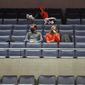 A few fans watch Virginia play St. Francis during an NCAA college basketball game Tuesday, Dec. 1, 2020, in Charlottesville, Va. (Andrew Shurtleff/The Daily Progress via AP) ** FILE **