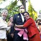 In this photo released by Government Spokesman Office, a well-wisher hugs Thailand&#x27;s Prime Minister Prayuth Chan-ocha in Samut Songkhram province, Thailand, Wednesday, Dec. 2, 2020. Thailand’s highest court is set to rule Wednesday on whether Prayuth has breached ethics clauses in the country’s constitution and should be ousted from his position. (Government Spokesman Office via AP)