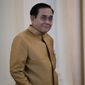 Thailand&#x27;s Prime Minister Prayuth Chan-ocha arrives to speak to the media during a press conference at Government House in Bangkok, Thailand, Tuesday, Dec. 1, 2020. (AP Photo/Sakchai Lalit)