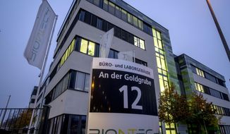 File -- In this Tuesday, Nov.10, 2020 file photo windows are illuminated at the headquarters of the German biotechnology company BioNTech in Mainz, Germany. Pfizer and BioNTech say they&#39;ve won permission Wednesday, Dec. 2, 2020, for emergency use of their COVID-19 vaccine in Britain, the world&#39;s first coronavirus shot that&#39;s backed by rigorous science -- and a major step toward eventually ending the pandemic.(AP Photo/Michael Probst, file)