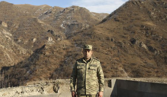 Anar Eyvazov, spokesperson of Azerbaijan&#39;s Defense Ministry stands outside during his interview with the Associated Press after the transfer of the Kalbajar region to Azerbaijan&#39;s control in Kalbajar Azerbaijan, Wednesday, Dec. 2, 2020. A Russia-brokered peace deal that took effect Nov. 10 obliged Armenian forces to hand over all of the Azerbaijani regions they held outside Nagorno-Karabakh, including the Kalbajar region. (AP Photo/Emrah Gurel)
