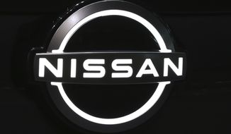 FILE - New Nissan Motor Co. logo is displayed at the global headquarters of Nissan Motor Co.,. in Yokohama near Tokyo, Wednesday, July 22, 2020.   Nissan says it will no longer support the Trump administration in its legal fight to end California’s ability to set its own auto-pollution and gas-mileage standards. The announcement Friday, Dec. 4,  is another sign that a coalition of automakers backing the outgoing administration is fracturing.  (AP Photo/Koji Sasahara, FILE)