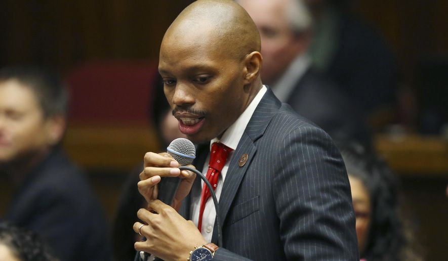 FILE - In this Jan. 13, 2020, file photo, Rep. Reginald Bolding, D-Laveen, speaks on the opening day of the legislative session at the Arizona Capitol in Phoenix. Bolding was named to lead House Democrats as minority leader, Tuesday, Nov. 10, 2020. (AP Photo/Ross D. Franklin, File)