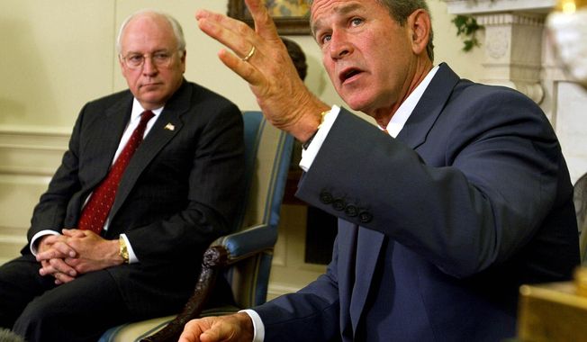 FILE - President George W. Bush, right, with Vice President Dick Cheney at his side, speaks during a meeting with congressional leaders in the White House Oval Office on Sept. 18, 2002. A new CNN Films documentary explores the role of the U.S. vice presidency, which in modern times has emerged into a more powerful position. Still, the film notes that  a veep’s duties are all up to the president. (AP Photo/Doug Mills, File)