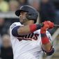 Minnesota Twins designated hitter Nelson Cruz (23) follows through on a single in the first inning of a spring training baseball game against the Pittsburgh Pirates in Fort Myers, Fla., in this Saturday, Feb. 29, 2020, file photo. Cruz is a free agent. (AP Photo/John Bazemore, File)