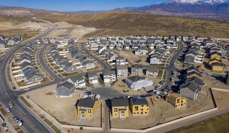 New home construction in Saratoga Springs on Thursday, Dec. 3, 2020. Utah’s population swelled by an estimated 52,820 people — equivalent to adding a city the size of Herriman — during the fiscal year that ended July 1, 2020, as a years-long economic boom ended and the pandemic and its recession began. (Rick Egan/The Salt Lake Tribune via AP)