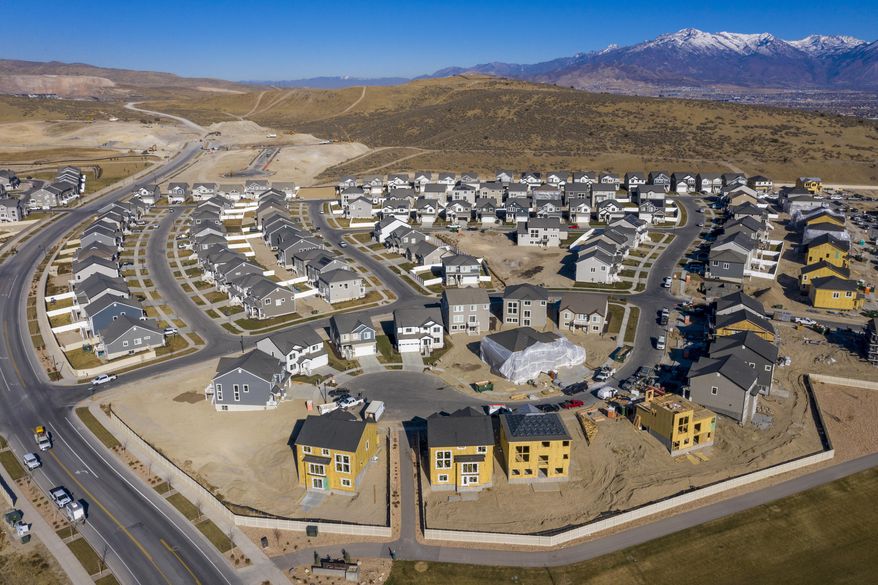 New home construction in Saratoga Springs on Thursday, Dec. 3, 2020. Utah’s population swelled by an estimated 52,820 people — equivalent to adding a city the size of Herriman — during the fiscal year that ended July 1, 2020, as a years-long economic boom ended and the pandemic and its recession began. (Rick Egan/The Salt Lake Tribune via AP)