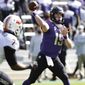 TCU quarterback Max Duggan (15) throws downfield against Oklahoma State during the first half of an NCAA college football game Saturday, Dec. 5, 2020, in Fort Worth, Texas. (AP Photo/Ron Jenkins)