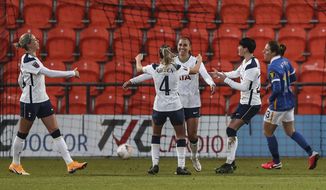 Tottenham Hotspur Women&#x27;s Alex Morgan, 3rd right, celebrates scoring her side&#x27;s third goal of the game against Brighton and Hove Albion during their FA Women&#x27;s Super League soccer match at The Hive stadium in London, Sunday Dec. 6, 2020.  (Kieran Cleeves//PA via AP)