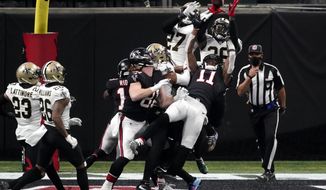 Atlanta Falcons wide receiver Julio Jones (11) misses a catch in the end zone on the last play of the game against the New Orleans Saints during the second half of an NFL football game, Sunday, Dec. 6, 2020, in Atlanta. The New Orleans Saints won 21-16. (AP Photo/John Bazemore)
